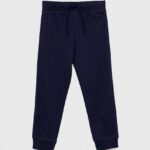 United Colors of Benetton pantaloni de trening din bumbac pentru copii culoarea albastru marin, cu imprimeu