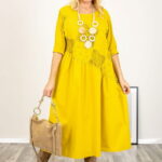 Rochie galbena oversize, cu taietura oblica si broderie, din poplin si jerseu