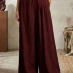 Pantaloni de vara din in cu croiala ampla si pliuri in talie, bordo