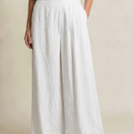 Pantaloni de vara din in cu croiala ampla si pliuri in talie, albi